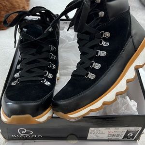 Like NEW!  ONLY WORN ONCE.  BLONDO WATERPROOF zip up winter bootie.